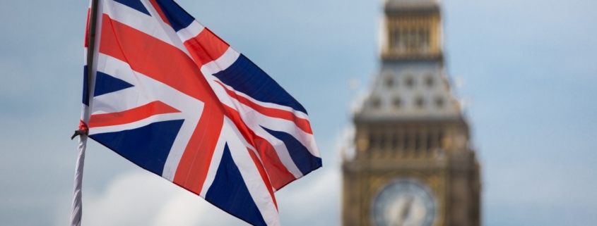 London's Big Ben clock tower and British flag